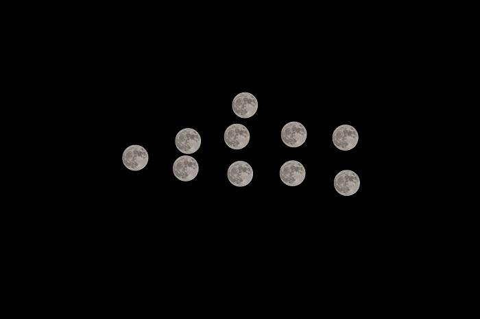 11、2022年6月14日凌晨，广西梧州，一轮“超级月亮”现身天宇，宛如白银。（多重曝光拍摄）（何华文）