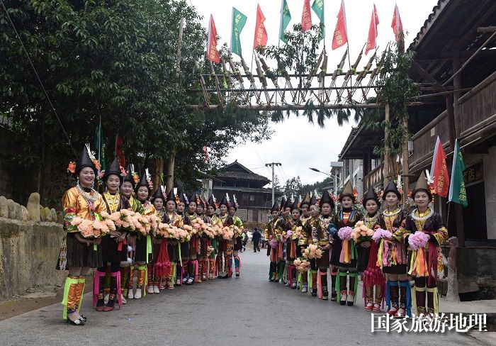 2023年12月13日，在贵州省从江县斗里镇台里村,身着盛装的苗族群众在参加一年一度的芦笙节活动。